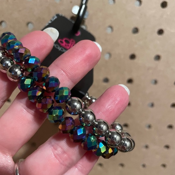 Set of TWO stretchy bracelets with silver ball and oil spill beads.